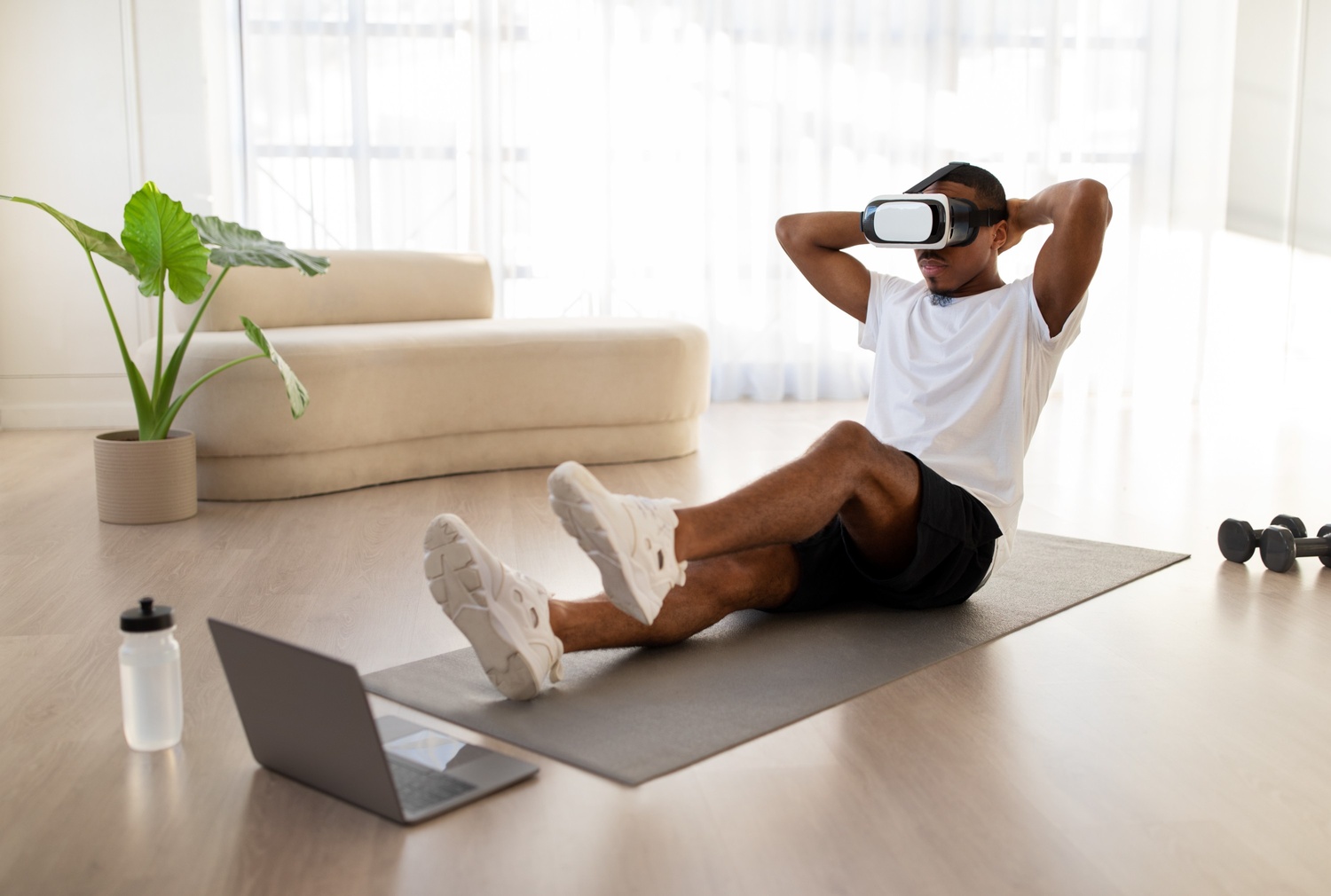 black guy have vurtual workout at home using vr he gr5rvdw.jpg